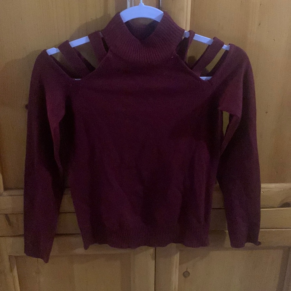 This is a burgundy shirt from Crave | fame size S